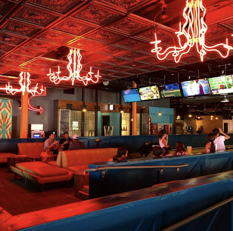 Competitive social venue with lanes and lounge seating